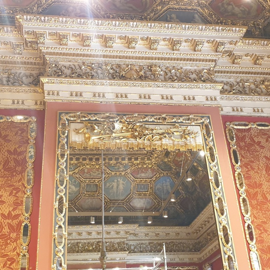 Red silk walls and gilding